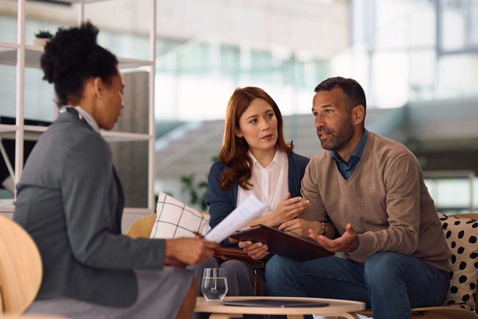 Couple with financial adviser