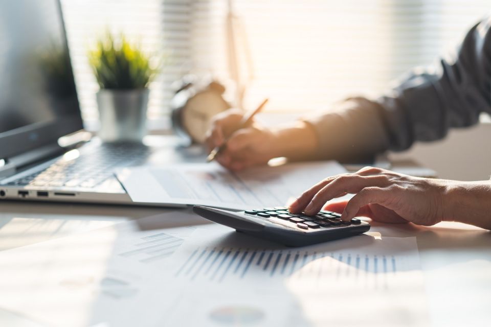 Woman at desk doing some tax planning