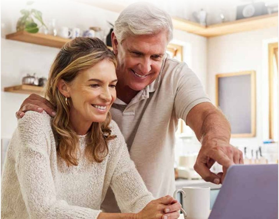 Couple checking their retirement plans