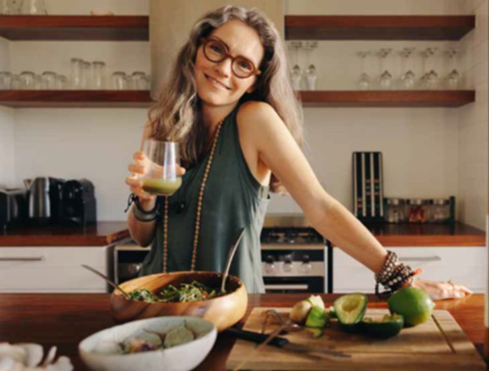 Woman relaxing in kitchen