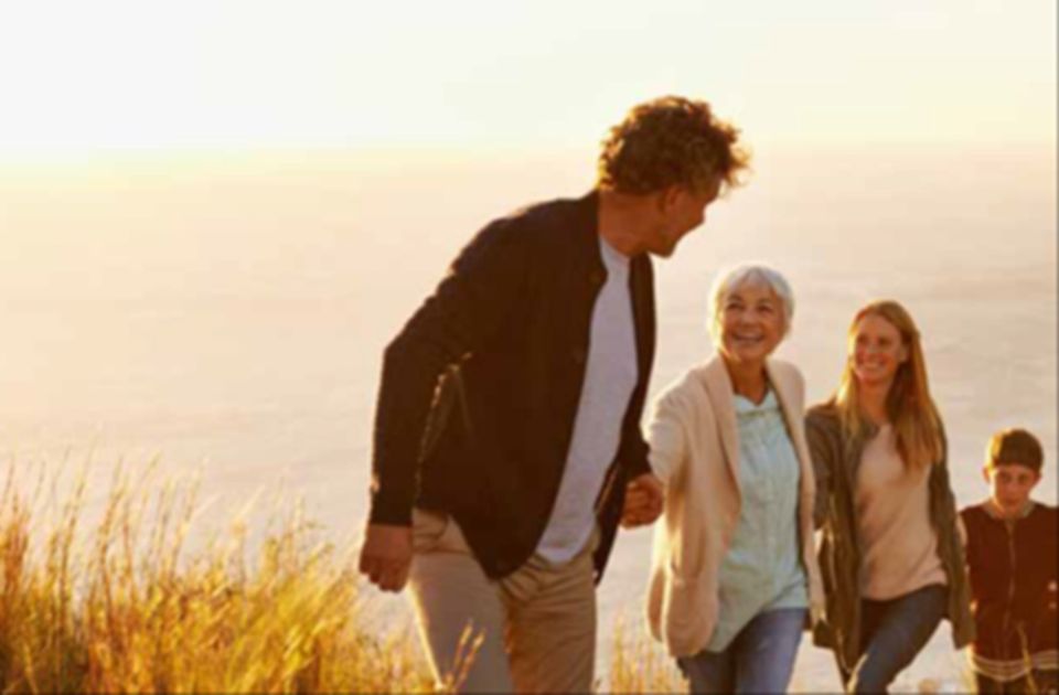 Family walking on a hill
